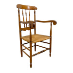 Antique oak and elm wooden armchair with cane seat