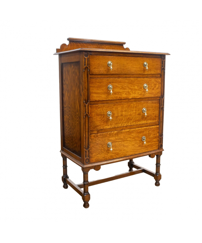 Narrow Oak Chest of Drawers with Art Deco Carving